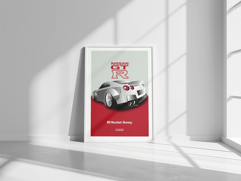 Puede incluir: Un p&oacute;ster blanco de Nissan GT-R con fondo rojo. El coche se muestra desde atr&aacute;s y el texto "NISSAN GT-R" est&aacute; en letras rojas. El texto "#1 Rocket Bunny" tambi&eacute;n est&aacute; en el p&oacute;ster.
