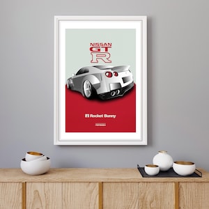 Puede incluir: Un Nissan GTR blanco con un fondo rojo y el texto "NISSAN GTR" y "El Rocket Bunny" en rojo.