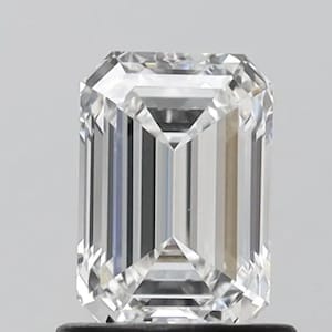 May include: A clear emerald cut diamond with a brilliant shine.