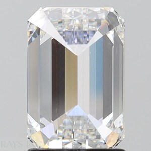 May include: A clear emerald cut diamond with a brilliant shine.