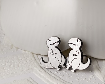 Pendientes de dinosaurio T-Rex en acrílico plateado de Isette