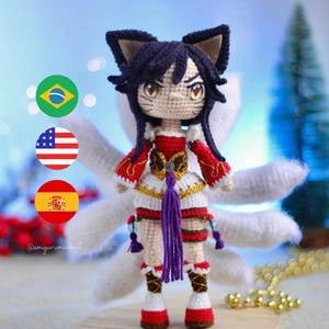 May include: A crocheted amigurumi doll of a character with purple hair, red and white clothing, and a white fluffy tail. The doll is standing on a wooden platform with a background of a green Christmas tree and three flags: Brazil, USA, and Spain.