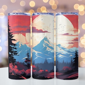 Può includere: Tre bicchieri in acciaio inossidabile con un design a tema montagna e cielo al tramonto. I bicchieri sono isolati e hanno una costruzione a doppia parete.
