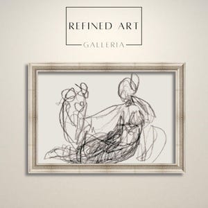May include: A black and white line drawing of two figures in a seated pose. The drawing is framed in a white frame with a gold trim.