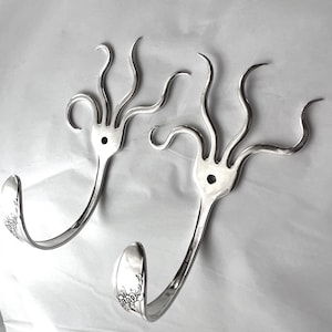Twee funky vorkhaken vintage teruggewonnen zilverwerk