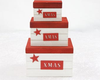 Juego de 3 cajas de madera navideñas con tapa para guardar regalos y decoración navideña.