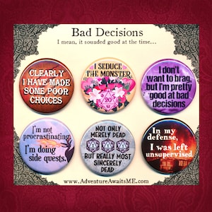 May include: Six round buttons with humorous sayings about bad decisions, role-playing games, and fantasy. The buttons are colorful and feature illustrations of dice, monsters, and other fantasy elements. The text on the buttons includes phrases like "I seduce the monster", "I'm not procrastinating, I'm doing side quests", and "Not only merely dead, but really most sincerely dead".