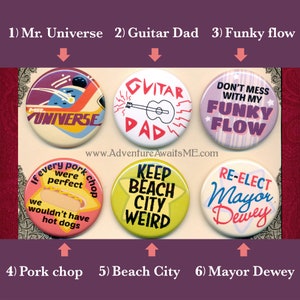 May include: Ten colorful button pins with various designs and text. The pins feature designs such as a guitar, a hot dog, a beach city, and a mayor. The text on the pins includes "Mr. Universe", "Guitar Dad", "Funky Flow", "Keep Beach City Weird", and "Re-Elect Mayor Dewey".