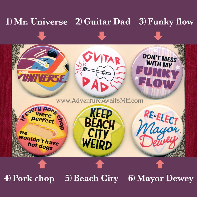 May include: Ten colorful button pins with various designs and text. The pins feature designs such as a guitar, a hot dog, a beach city, and a mayor. The text on the pins includes "Mr. Universe", "Guitar Dad", "Funky Flow", "Keep Beach City Weird", and "Re-Elect Mayor Dewey".