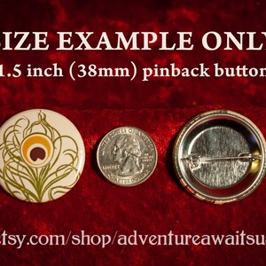 May include: A 1.5 inch (38mm) pinback button with a green and yellow peacock feather design. The button is shown next to a US quarter for size comparison.