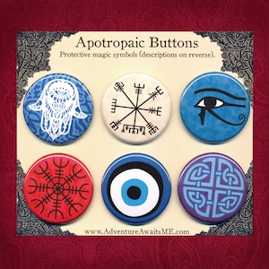Conjunto de botones apotropaicos: pines, insignias, protección, hamsa, vegvisir, ojo de Horus, yelmo del asombro, Nazar, escudo celta, nudo, amuleto