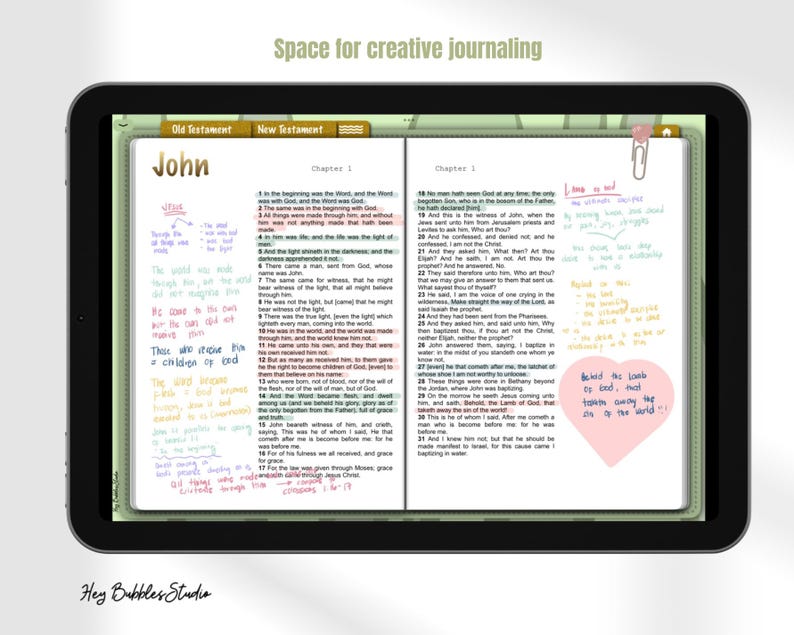 May include: A digital tablet displaying a page from the Bible, the book of John, with handwritten notes in various colours. The tablet is on a green background with the text "Space for creative journaling".
