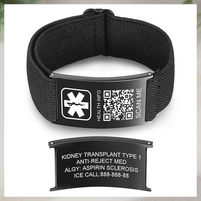 May include: Black medical ID bracelet with a fabric band and a metal plate. The plate has a medical symbol, a QR code, and the words "HEALTH INFO" and "SCAN ME." A separate plate lists medical information, including "KIDNEY TRANSPLANT TYPE 1."
