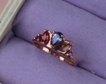 Vivid Spectrum wedding band or engagement ring in 14K rose gold with coloured sapphires, amethyst and rubies