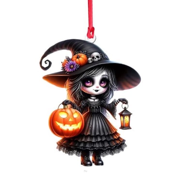 May include: A black and white witch doll ornament with a black hat, a pumpkin, and a lantern. The doll has long black hair and is wearing a black dress with a white collar. The ornament is perfect for Halloween decorations.