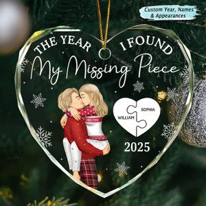 May include: A heart-shaped Christmas ornament featuring a couple embracing, with the text "The Year I Found My Missing Piece." The ornament includes the names "William" and "Sophia" in a puzzle piece design, with the year 2025.