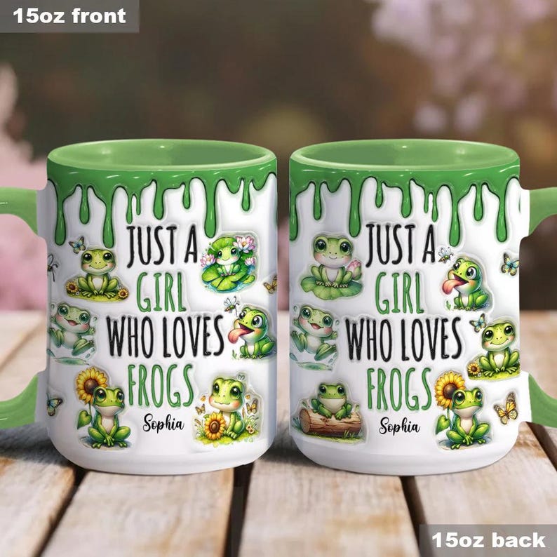 May include: A white ceramic mug with a green drip design. The mug features a cartoon frog design and the text "Just a girl who loves frogs" with the name "Sophia".