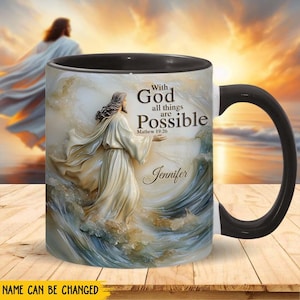 May include: A black and white mug with a colourful image of Jesus walking on water. The mug has the text "With God all things are Possible" and "Matthew 19:26". The name "Jennifer" is printed below the text.