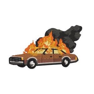 May include: An embroidered patch depicting a brown car engulfed in flames. The flames are orange and yellow, with black smoke billowing from the top. The car has black tires and a detailed front grill.