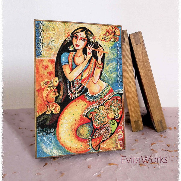 Desi dancer Indian mermaid home on natural wooden block, divine feminine