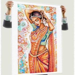 May include: An artistic print of a woman in traditional Indian attire. The artwork features a woman in an orange sari with intricate gold jewelry, set against a backdrop of colorful floral patterns. The woman is depicted with her hands raised, adjusting her headpiece.