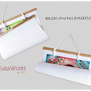 May include: Two examples of rolled canvas wall hangers with wooden dowels and white rope. The canvas is rolled up and secured with the dowel. The top of the dowel has a white rope attached to it for hanging. The canvas is white and the dowel is natural wood. The text "ROLLED CANVAS WALL HANGER EXAMPLE" is visible at the top of the image.