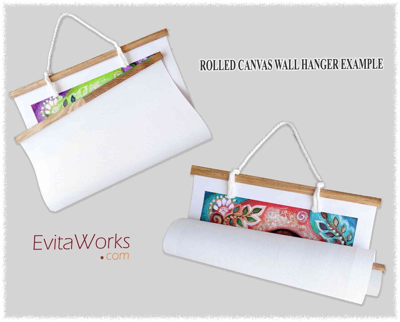 May include: Two examples of rolled canvas wall hangers with wooden dowels and white rope. The canvas is rolled up and secured with the dowel. The top of the dowel has a white rope attached to it for hanging. The canvas is white and the dowel is natural wood. The text "ROLLED CANVAS WALL HANGER EXAMPLE" is visible at the top of the image.
