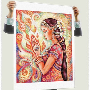 May include: A colorful painting of a woman in a red and gold sari with her hands in a prayer position. The woman has a third eye painted on her forehead and is surrounded by swirling patterns of orange, yellow, and blue.
