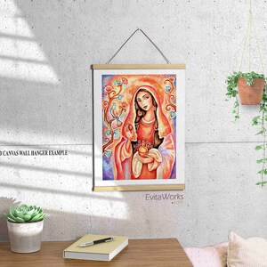 May include: A colorful painting of a woman in a red dress and a white veil, holding a golden chalice. The painting is set against a background of flowers and vines. The artist's signature, "EvitaWorks.com", is in the bottom right corner.