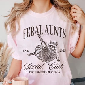 Feral Aunt Social Club Shirt, Funny Raccoon Shirt, Unhinged Shirt, Pregnancy Reveal Shirt, Feral Meme, Weirdcore Shirt, Aunt To Be Gifts