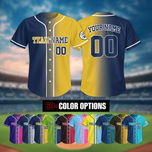May include: Two baseball jerseys with a split color design. The left jersey is navy blue and gold, the right jersey is gold and navy blue. Both jerseys have white piping and a white button placket. The left jersey has the text "TEAM NAME" and the number "00" on the front. The right jersey has the text "YOUR NAME" and the number "00" on the back. The jerseys are displayed against a baseball field background. Below the jerseys is the text "60+ COLOR OPTIONS". Below the text are 10 baseball jerseys in different colors.