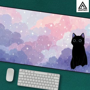 May include: A rectangular desk mat featuring a whimsical design of a black cat sitting in front of a dreamy, pastel-colored sky with clouds and stars. The mat has a black border and the logo "ARKADYSARTS" in the top right corner.