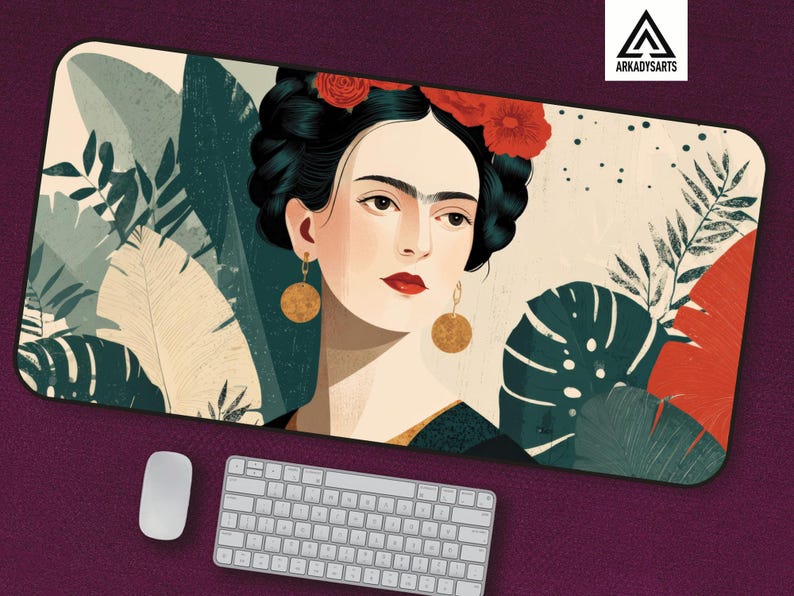 May include: A rectangular mousepad featuring a stylized portrait of a woman with dark hair adorned with red flowers and gold earrings. The background includes tropical foliage in shades of green, beige, and red. A white keyboard and mouse are below.