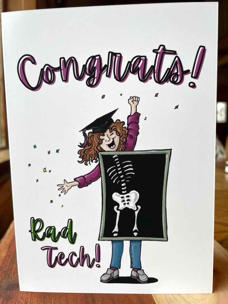May include: A graduation card with the words "Congrats!" in purple and black. The card features a cartoon illustration of a graduate wearing a cap and holding a skeleton x-ray. The words "Rad Tech!" are written in green and purple.