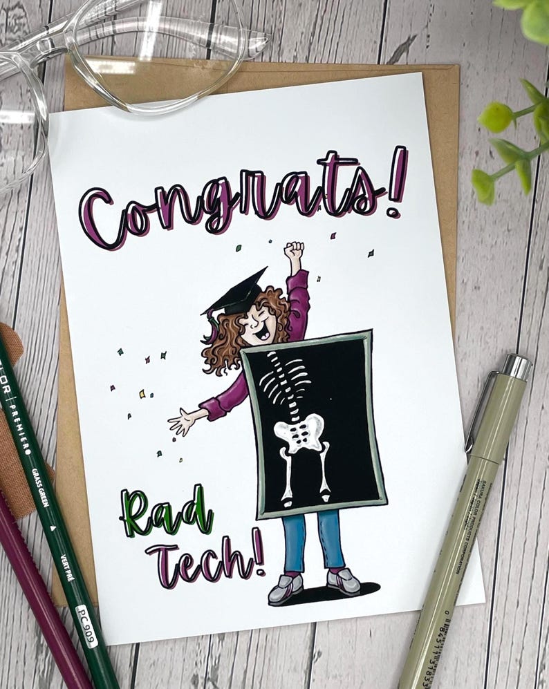 May include: A graduation card with the word "Congrats!" in purple script. The card features a cartoon illustration of a graduate wearing a cap and holding a sign with a skeleton image. The words "Rad Tech!" are written in green.