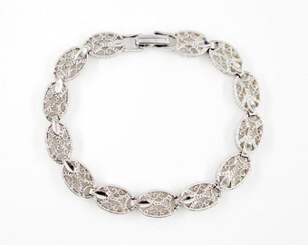 Napier Bracelet Scrolled Filigree Silver tone 7 1/4 Pat