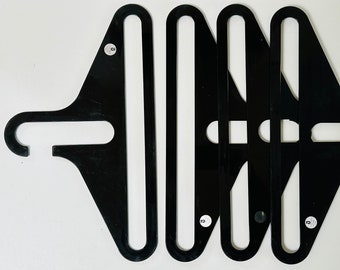 set of 4 black vintage Clothes Hangers, marked Danilo Silvestrin, German 1970s mid century mod pop space age coat hanger