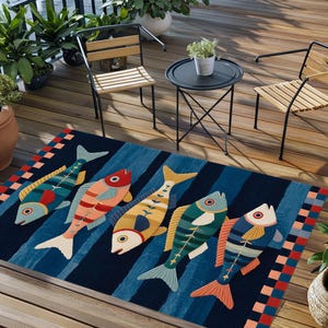 May include: A rectangular area rug featuring a dark blue background with vertical stripes and a repeating pattern of five stylized fish in shades of teal, orange, yellow, and green, bordered by a colorful checkered pattern on two sides.
