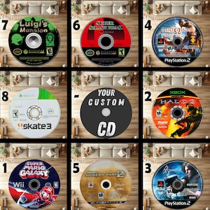 May include: Nine video game discs are displayed, featuring titles like "Luigi's Mansion," "Super Smash Bros.," "God of War," "Halo 2," "Super Mario Galaxy," "Call of Duty: Modern Warfare," and "Resident Evil." One disc is a custom CD. The discs are arranged in a grid.