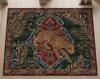 May include: A rectangular area rug featuring a central leopard illustration set against a deep red and dark green background. The design includes intricate floral motifs, palm leaf patterns, and a decorative border in shades of gold, blue, and red.