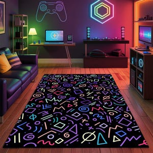May include: A black rectangular rug with a colorful geometric pattern of shapes and lines. The rug features neon pink, blue, green, and purple designs. The rug is placed on a wooden floor in a room with a gaming theme.