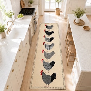 May include: A long, rectangular kitchen runner rug featuring a cream-colored background with a repeating vertical pattern of seven chickens. Each chicken has a bright red comb and wattle, with varying black, white, and gray textured plumage patterns.