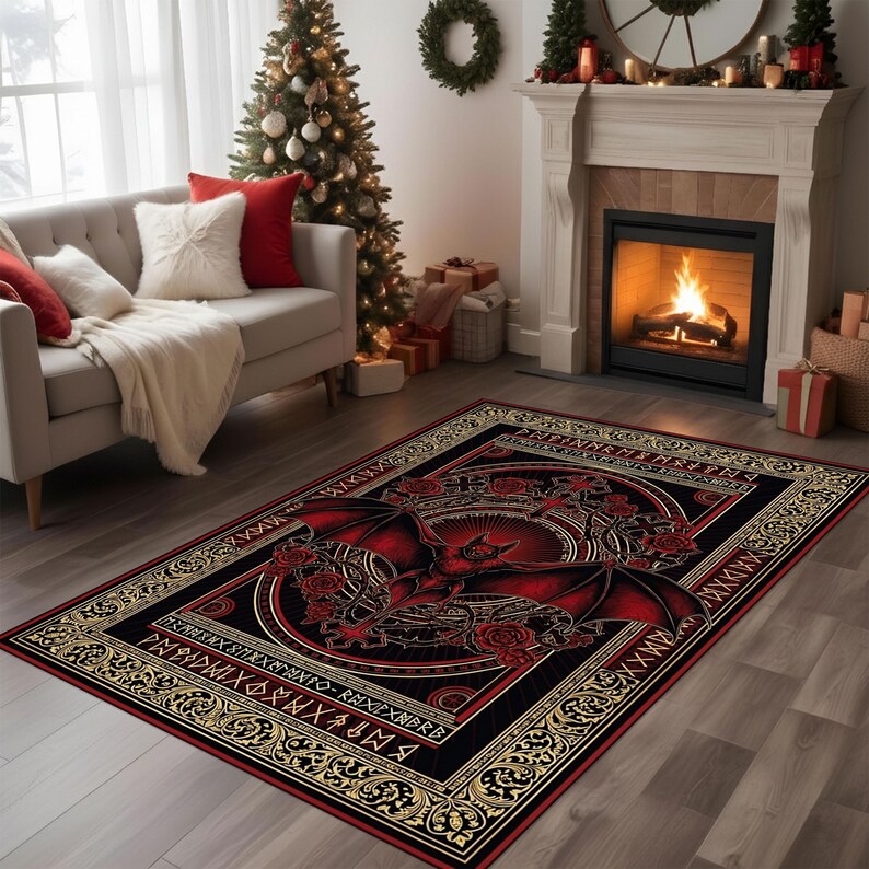 May include: A rectangular area rug with a gothic design featuring a red bat with outstretched wings, roses, and a circular emblem on a black background. The rug has a gold border with runic symbols and is placed in a living room.