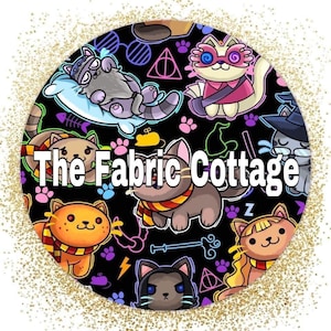 May include: A black background with a repeating pattern of cats wearing glasses, scarves, and hats. The cats are in various poses, including sleeping, sitting, and standing. The text "The Fabric Cottage" is in the center of the image.