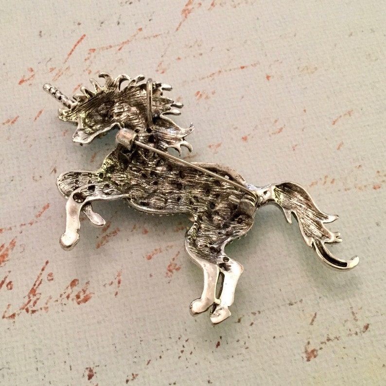 Green Crystal Rhinestone Unicorn Shaped BroochPin on Silver Tone Setting