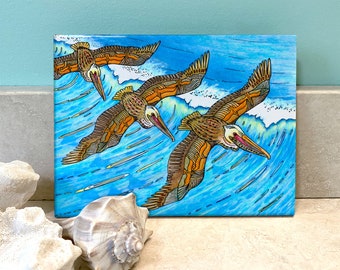 Wings Over Waves Flying Pelicans Ceramic Tile Wall Art