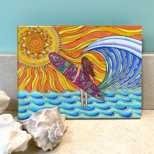 May include: A colorful illustration of a surfer girl standing on a wave with a surfboard. The sun is shining brightly in the background. The artwork is done in a vibrant style with a lot of detail.