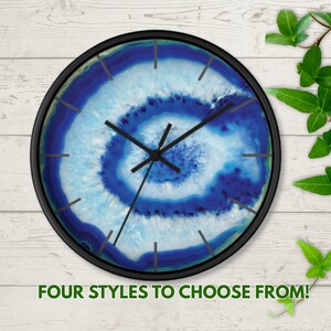 May include: A round wall clock with a black frame and a face featuring a blue and white agate stone pattern. The clock has black hour, minute, and second hands. The text "FOUR STYLES TO CHOOSE FROM!" is printed in green at the bottom of the image.