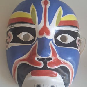 Eine Vintage mehrfarbige handbemalte Papier Mache Gesichtsmaske