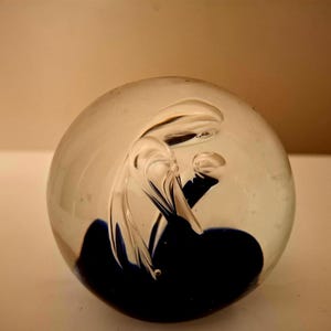 A Small Glass Paperweight with Controlled Bubble Formation